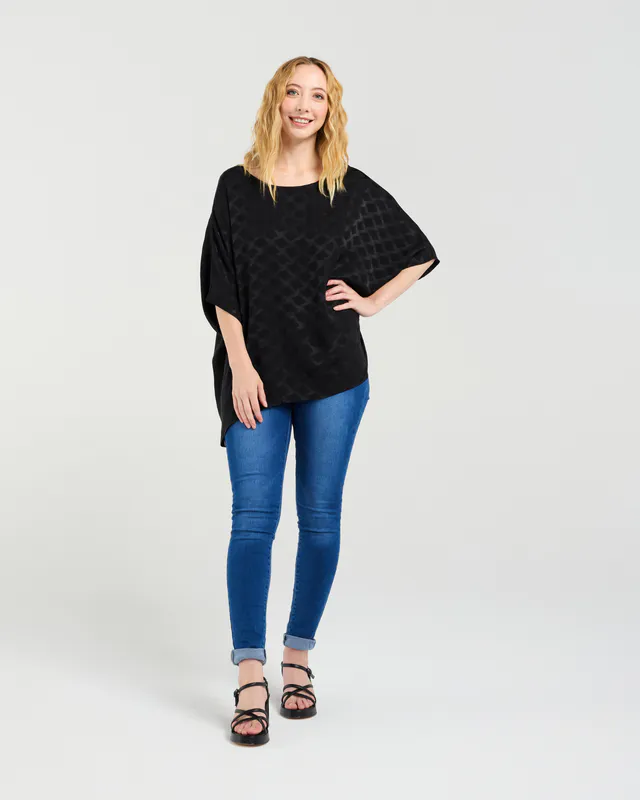 Model wearing Black Clara Top By Seduce Available at Beetees Nelson