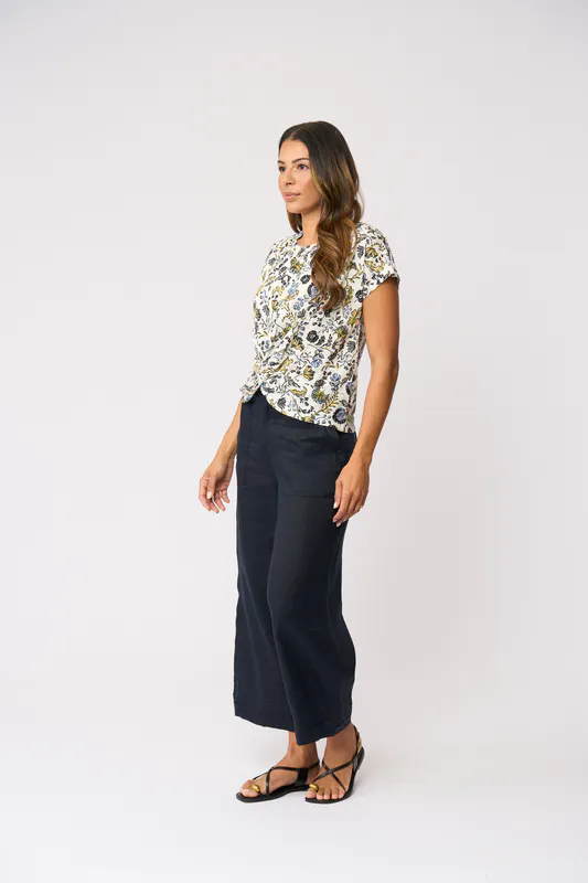 Model wearing Folk Story Do The Twist Top By Foil Available at Beetees Nelson