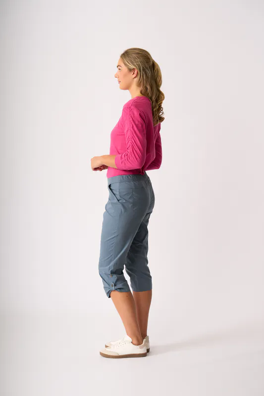 Model wearing Steel Roll Up Trousers By Esplanade Available at Beetees Nelson