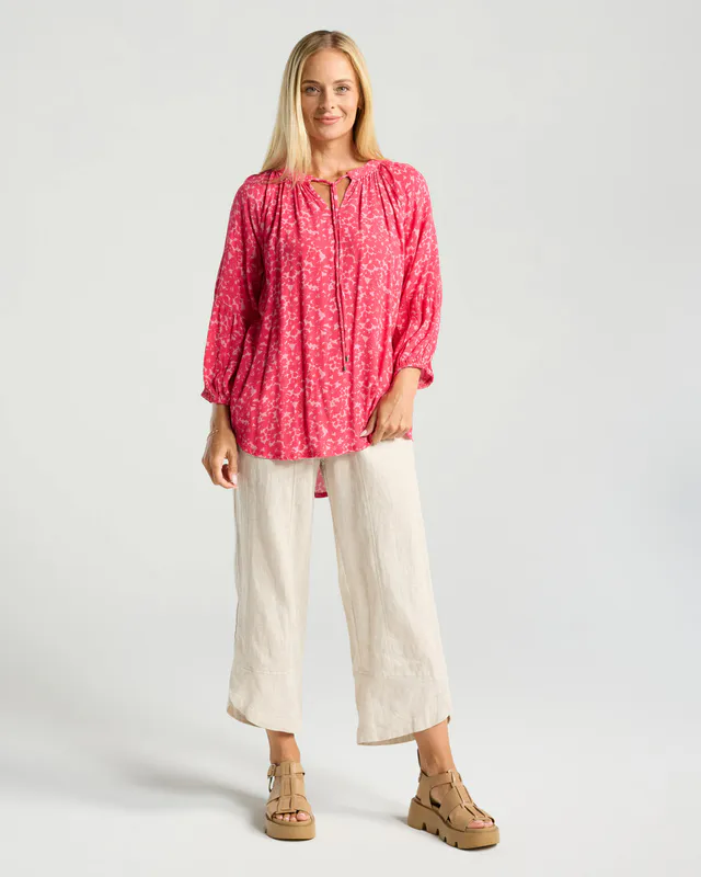 Model wearing Secret Garden Rose Sorbet Monica Gathered Sleeve Top By Blackstone Available at Beetees Nelson