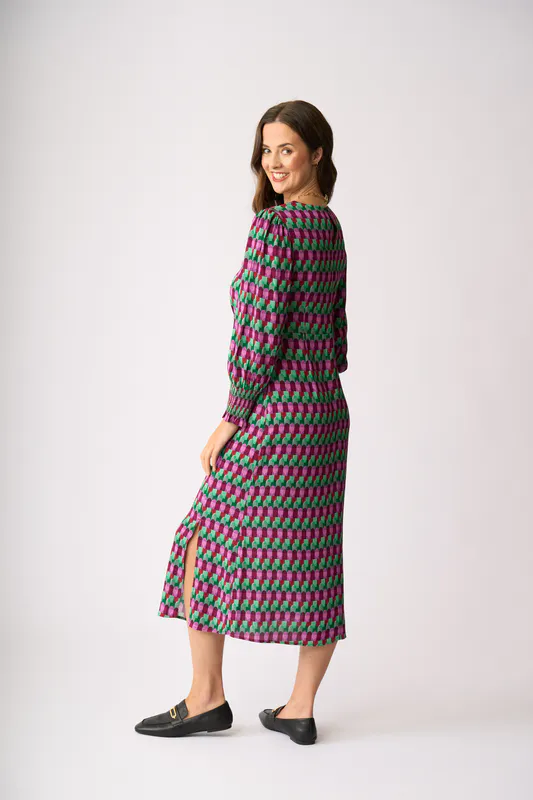 Model wearing Art Deco Curved & Shirred Dress By Foil Available at Beetees Nelson