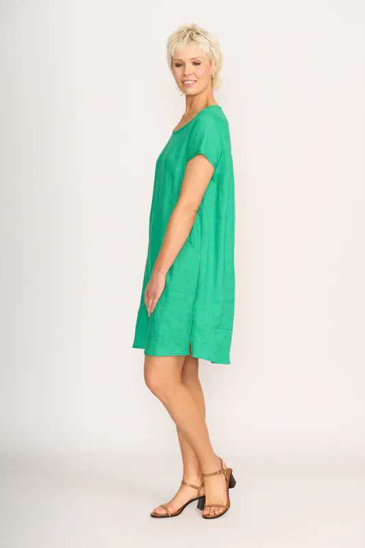 Model wearing Green Dress - Panel Lines By Foil Available at Beetees Nelson