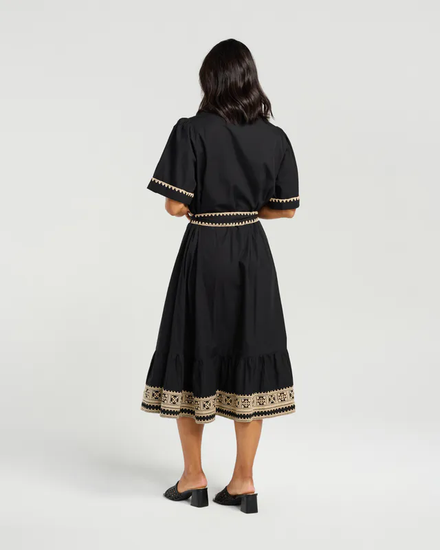 Model wearing Black Ginny Dress By NMBR Rose Available at Beetees Nelson