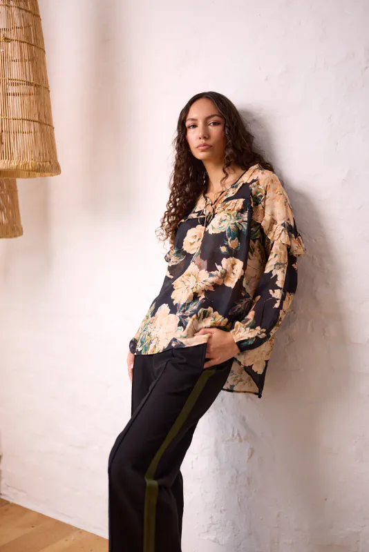 Model wearing Black Floral Sway Blouse By Navy & Co. Available at Beetees Nelson