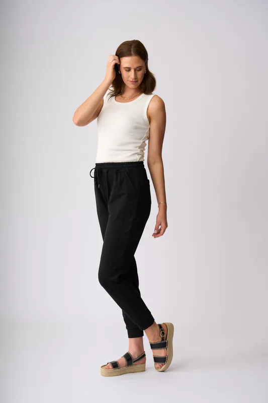 Model wearing Black Kaiuma Pant By Charlie Jane Available at Beetees Nelson