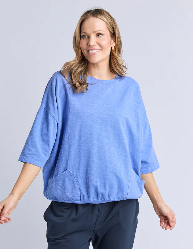 Model wearing Blue Maize Sweat By Elm Available at Beetees Nelson