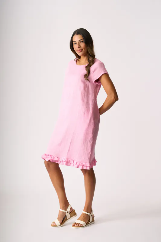 Model wearing Pink Ruffle Dreams Dress By Foil Available at Beetees Nelson