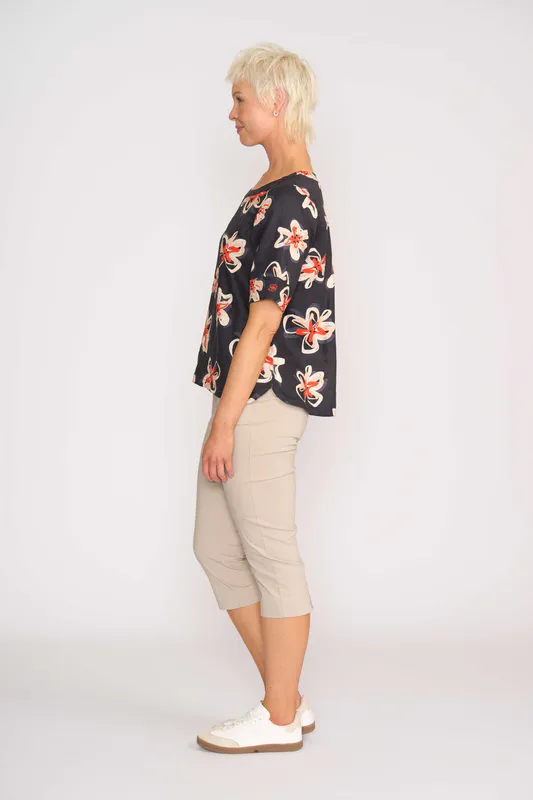 Model wearing Flower Doodle Pleat Back Top By Foil Available at Beetees Nelson