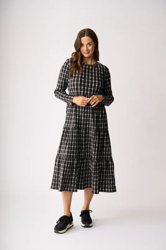 Model wearing Check Velveteen Dress By Memo Available at Beetees Nelson