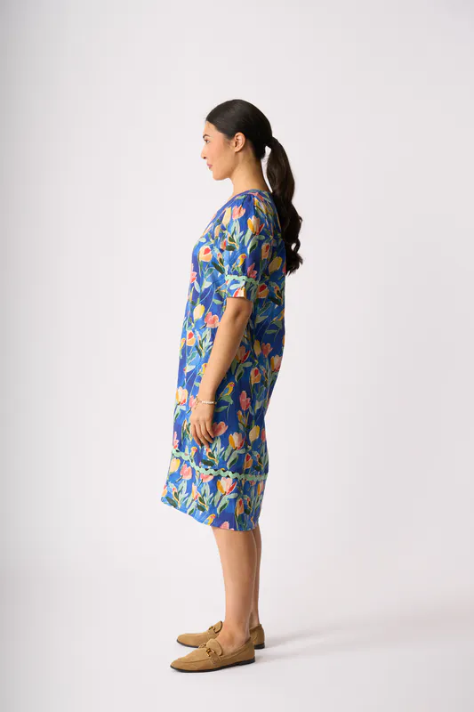 Model wearing Tropical Retreat Trim Time Dress By Foil Available at Beetees Nelson