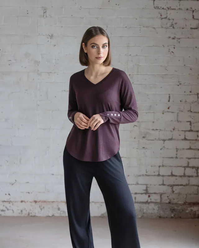 Model wearing Dragonfly Veni Merino Top By Vassalli Available at Beetees Nelson