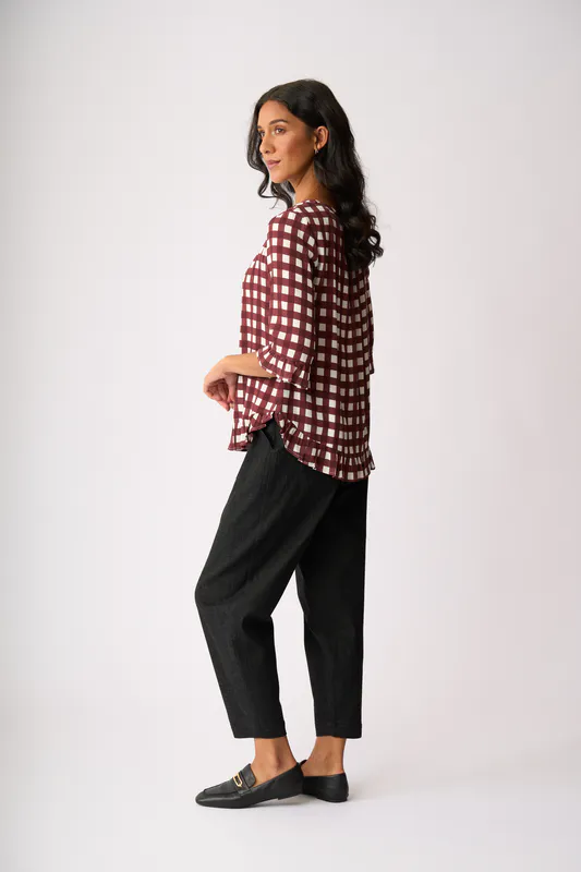 Model wearing Cocoa Check Gathered Scoop Hem Top By Foil Available at Beetees Nelson