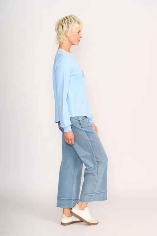 Model wearing Sky Aroha Sweater - Wander By Memo Available at Beetees Nelson