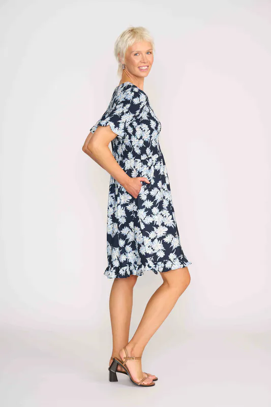 Model wearing Navy Sketch Floral Shirred Body And Sleeve Dress By Foil Available at Beetees Nelson