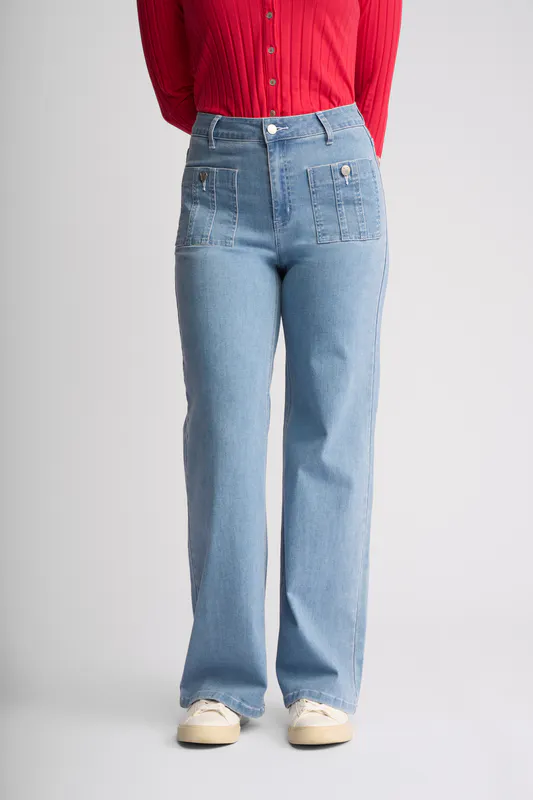 Model wearing Light Wash Denim Lottie Jean By Vassalli Available at Beetees Nelson