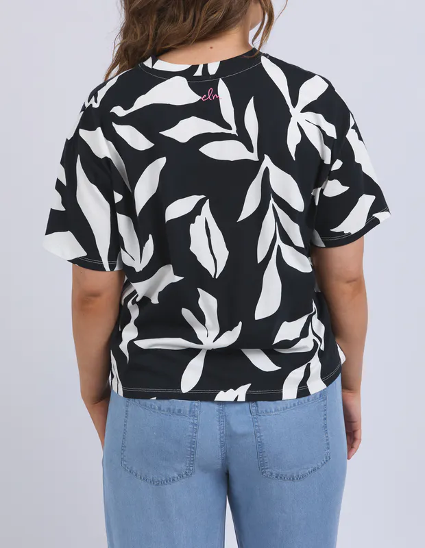 Model wearing Black Mimosa Tee By Elm Available at Beetees Nelson