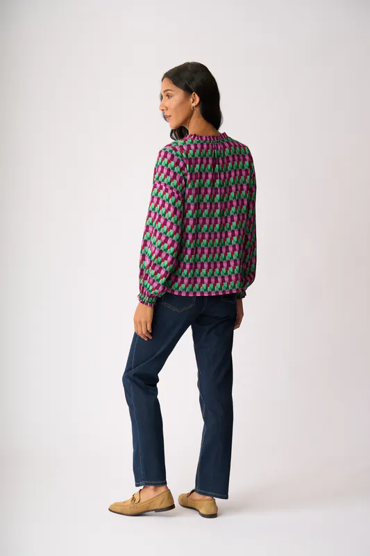 Model wearing Art Deco Elasticated Cuff Blouse By Foil Available at Beetees Nelson