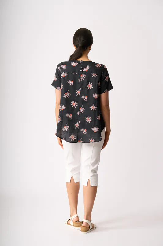 Model wearing In Flower Top - Swing, Up Down Hem By Preen Available at Beetees Nelson