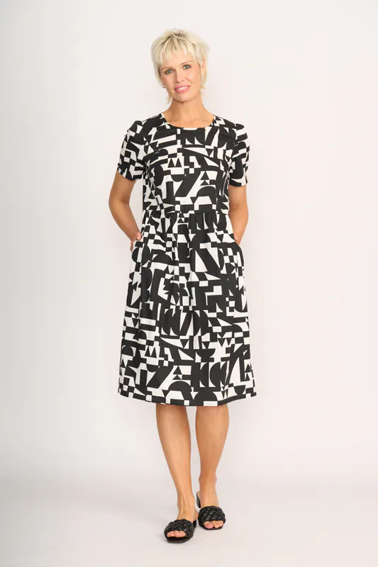 Model wearing Abstract Back Keyhole Dress By Foil Available at Beetees Nelson