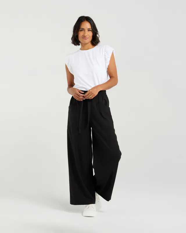Model wearing Black Chloe Pant By Et Alia Available at Beetees Nelson