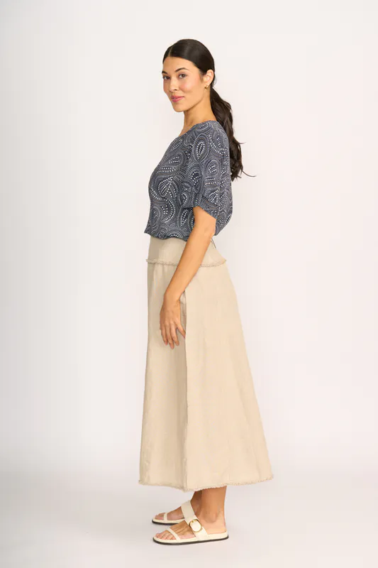 Model wearing Midnight Stars Podium Top By Foil Available at Beetees Nelson