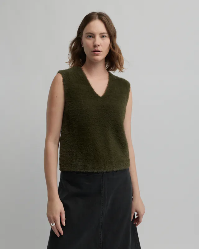 Model wearing Loden Hearth Knit Vest Hearth Knit Vest By Yarra Trail Available at Beetees Nelson