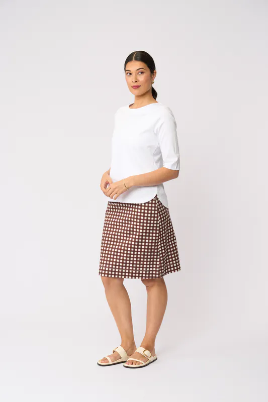 Model wearing Check IT Tee-Rific Skirt - Printed By Esplanade Available at Beetees Nelson