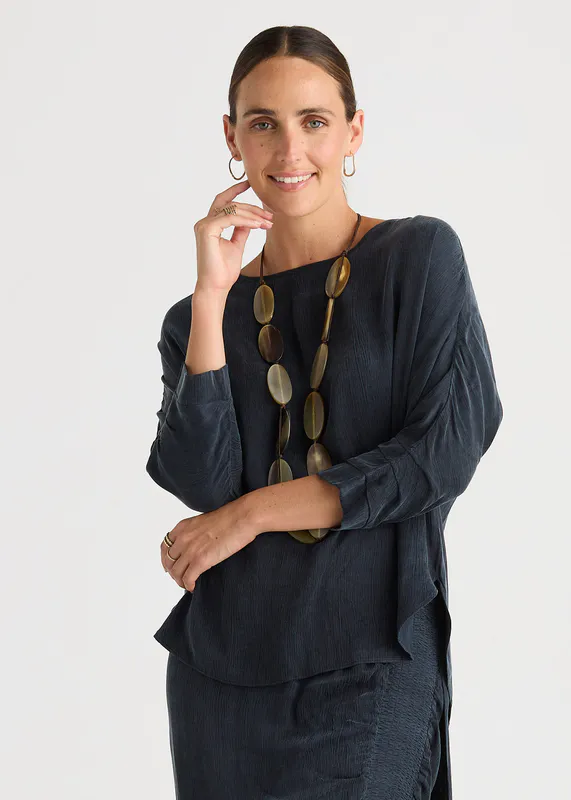 Model wearing Dusk Evening Flow By LD + CO Available at Beetees Nelson