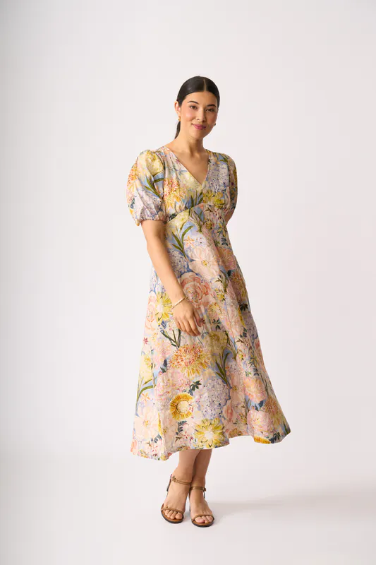 Model wearing Peonies Empire-Ly Yours Dress By Foil Available at Beetees Nelson
