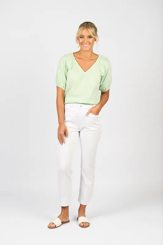 Model wearing White Denim Slim Leg Ankle Grazer Jean By Vassalli Available at Beetees Nelson