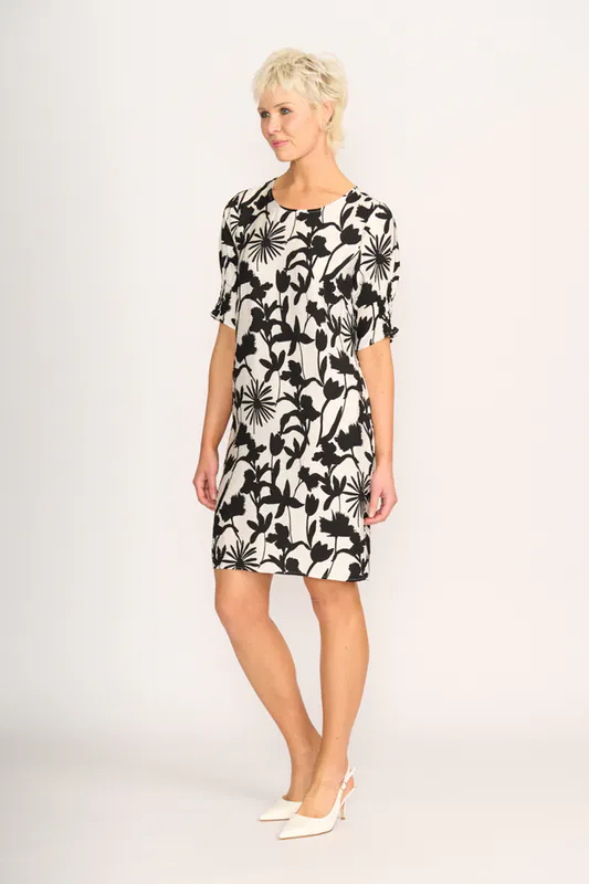 Model wearing Sihouette Dress - Shirr The Cuff By Foil Available at Beetees Nelson