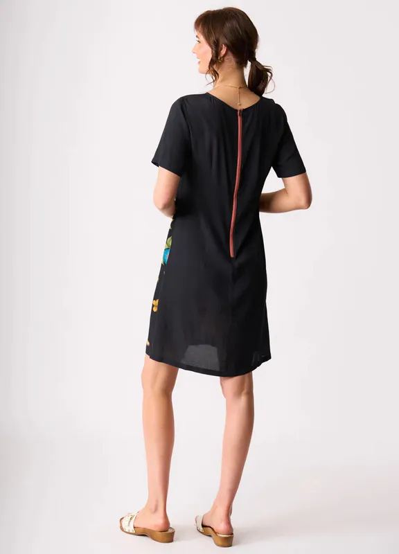 Model wearing Wonderland Shifty Fun Dress By Foil Available at Beetees Nelson