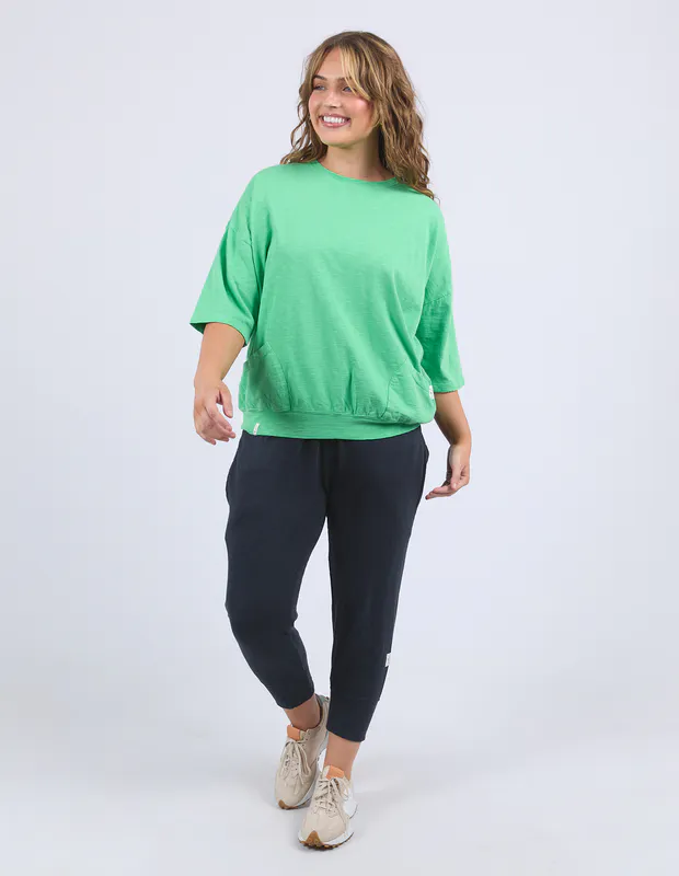 Model wearing Spring Green Maize Sweat By Elm Available at Beetees Nelson