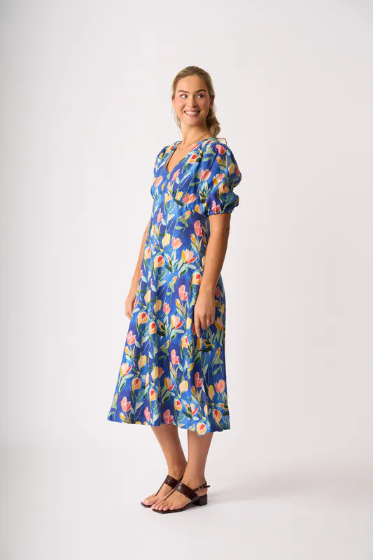 Model wearing Tropical Retreat Empire-Ly Yours Dress By Foil Available at Beetees Nelson