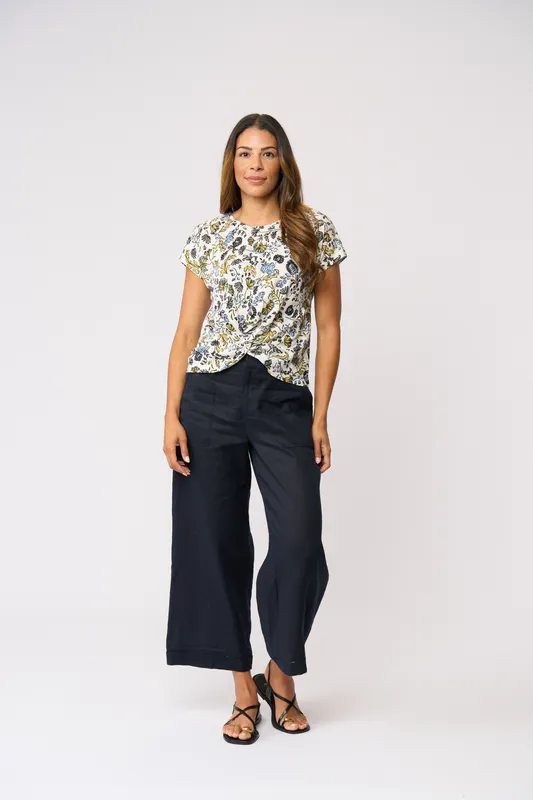 Model wearing Folk Story Do The Twist Top By Foil Available at Beetees Nelson