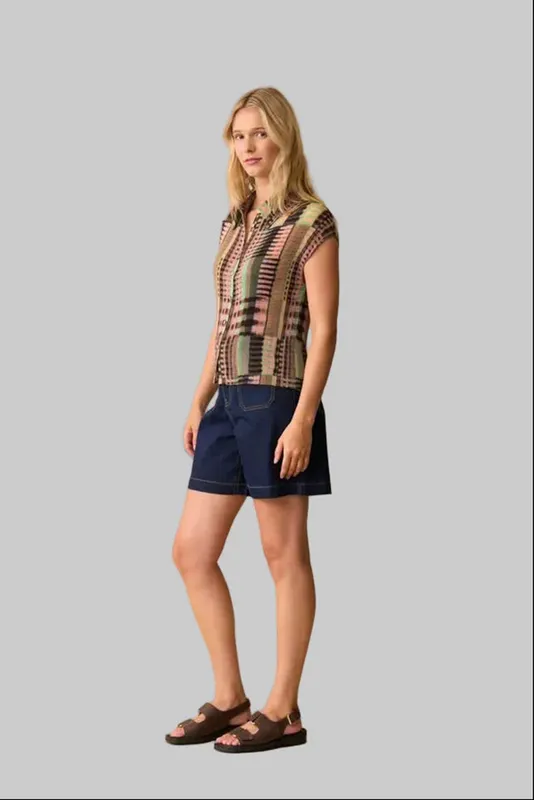 Model wearing Kaleidoscope Kali Shirt By Neris Available at Beetees Nelson