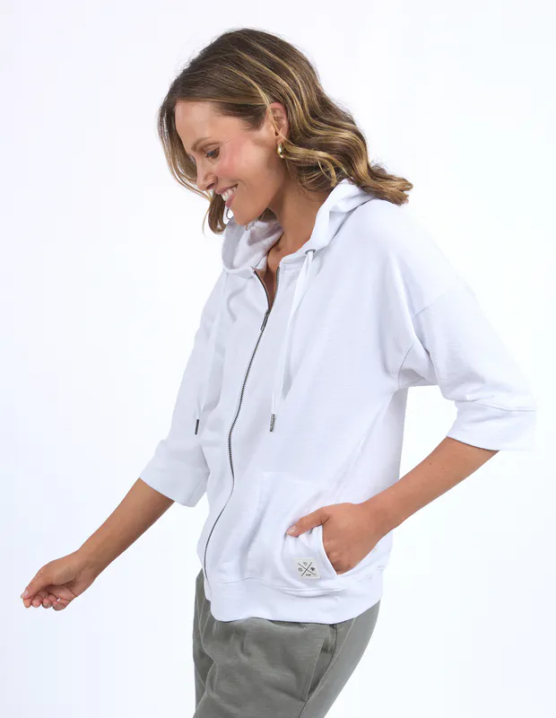 Model wearing White Beachy Zip Hoodie By Elm Available at Beetees Nelson