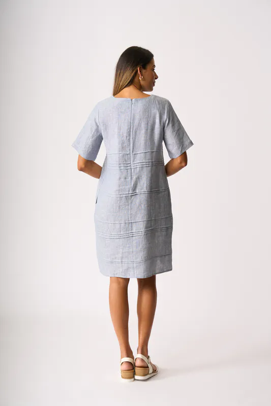 Model wearing Pale Blue Cross Dye Crowd Favourite Dress By Foil Available at Beetees Nelson