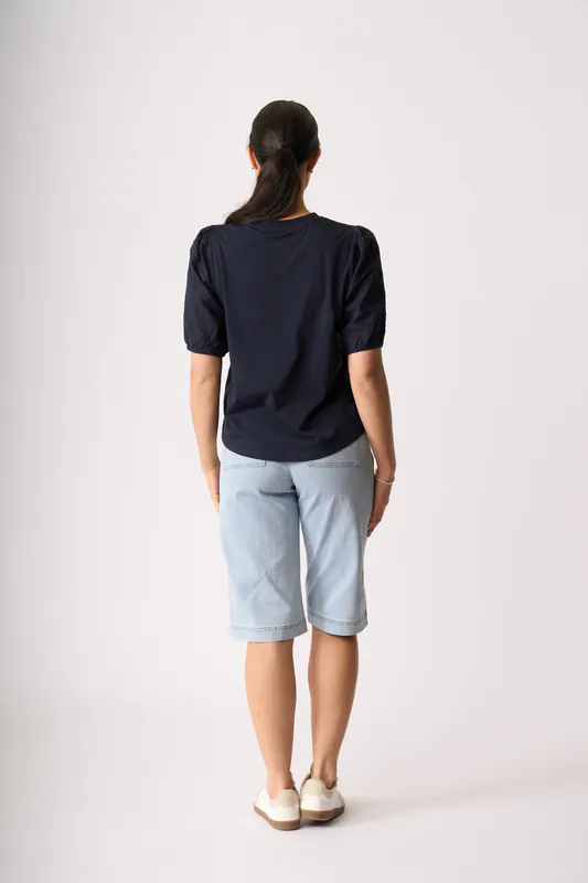 Model wearing True Navy Broderie Sleeve Top By Memo Available at Beetees Nelson