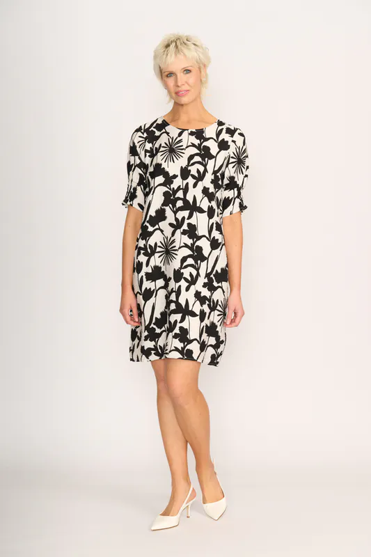 Model wearing Sihouette Dress - Shirr The Cuff By Foil Available at Beetees Nelson