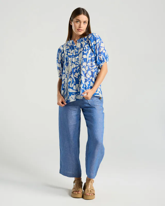 Model wearing Blue Ivory Floral Bridget Pintuck Top By Blackstone Available at Beetees Nelson