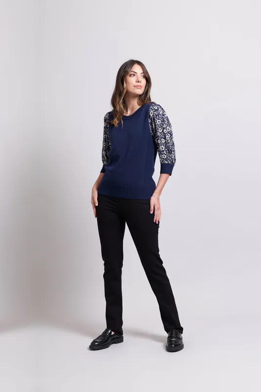 Model wearing Navy/Blooms Coloured Jumper -Contrast Woven Short Sleeve By Memo Available at Beetees Nelson