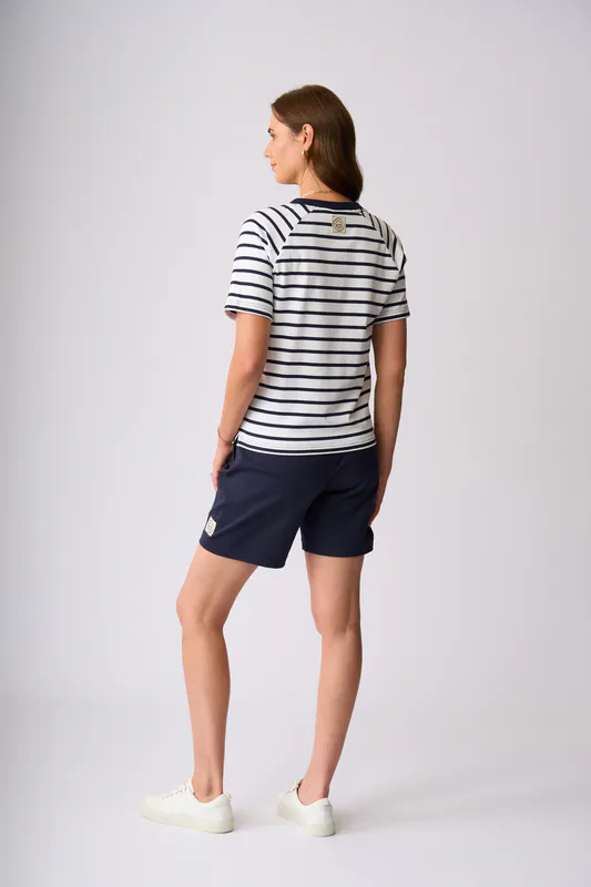 Model wearing White Navy Stripe St James Top By Charlie Jane Available at Beetees Nelson