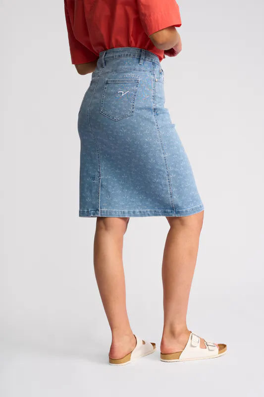 Model wearing Meadow Denim Poppy Skirt By Vassalli Available at Beetees Nelson