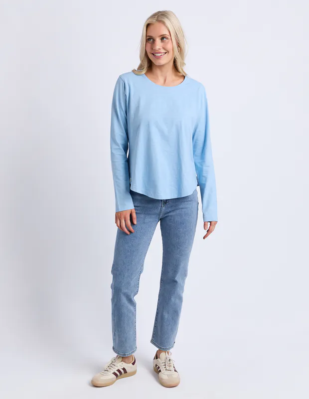 Model wearing Light Blue Everyday Long Sleeve By Elm Available at Beetees Nelson