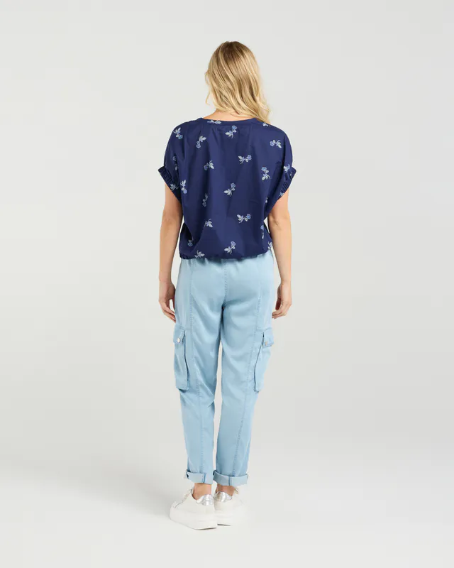 Model wearing Bluebell Garden Harlee Top By Et Alia Available at Beetees Nelson