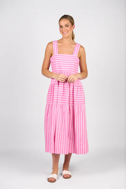 Model wearing Pink Stripe Sleeveless Tiered Dress with Wide Straps By Vassalli Available at Beetees Nelson