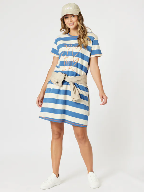 Model wearing Blue/Natural Love & Kisses Dress By Threadz Available at Beetees Nelson