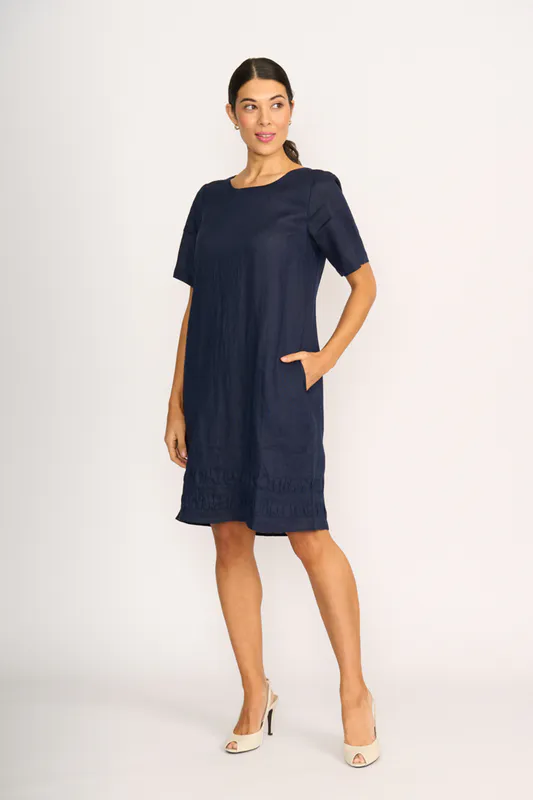 Model wearing Navy Crowd Pleaser Dress By Foil Available at Beetees Nelson