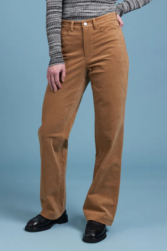 Model wearing Tan Coloured Strike A Cord Pant By Siren Available at Beetees Nelson